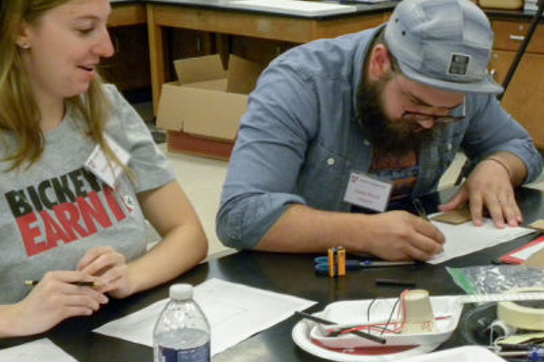 adults participating in a STEM activity 